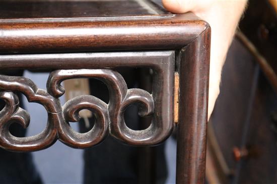 A Chinese carved hardwood nest of five tea tables W.37cm